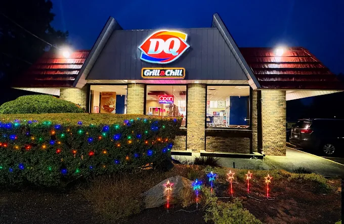 Dairy Queen Grill & Chill storefront at dusk